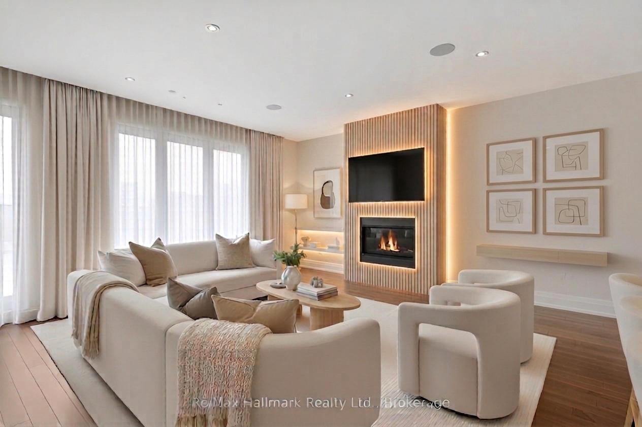 Neutral living room with fluted fireplace surround