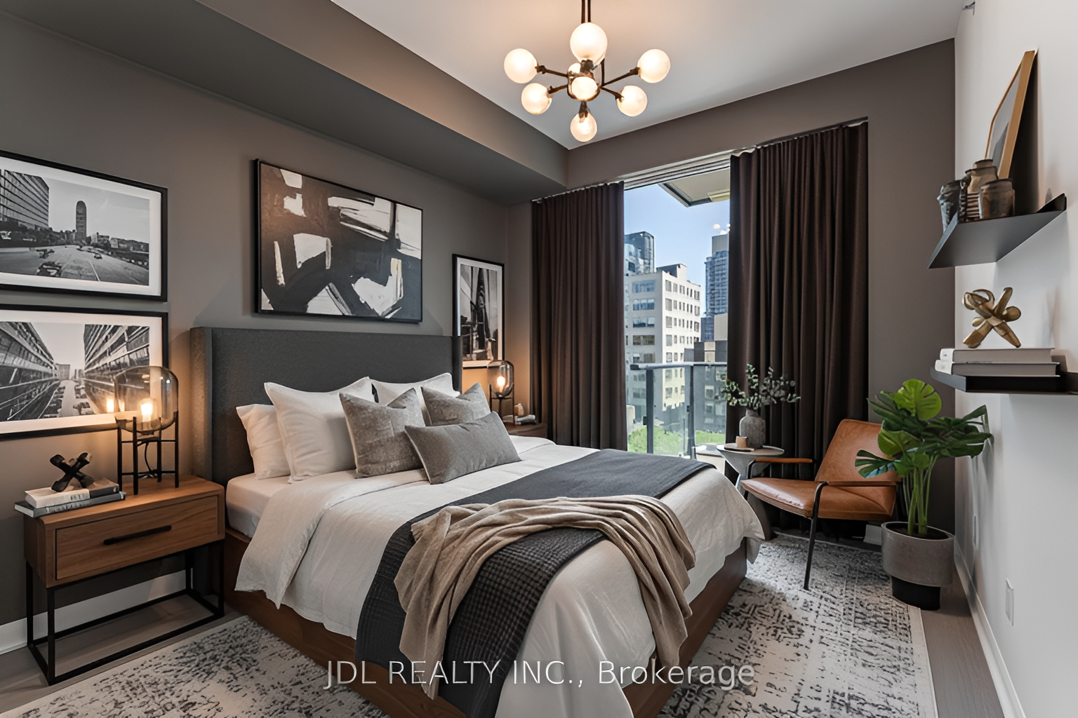 Moody city primary bedroom with brass chandelier